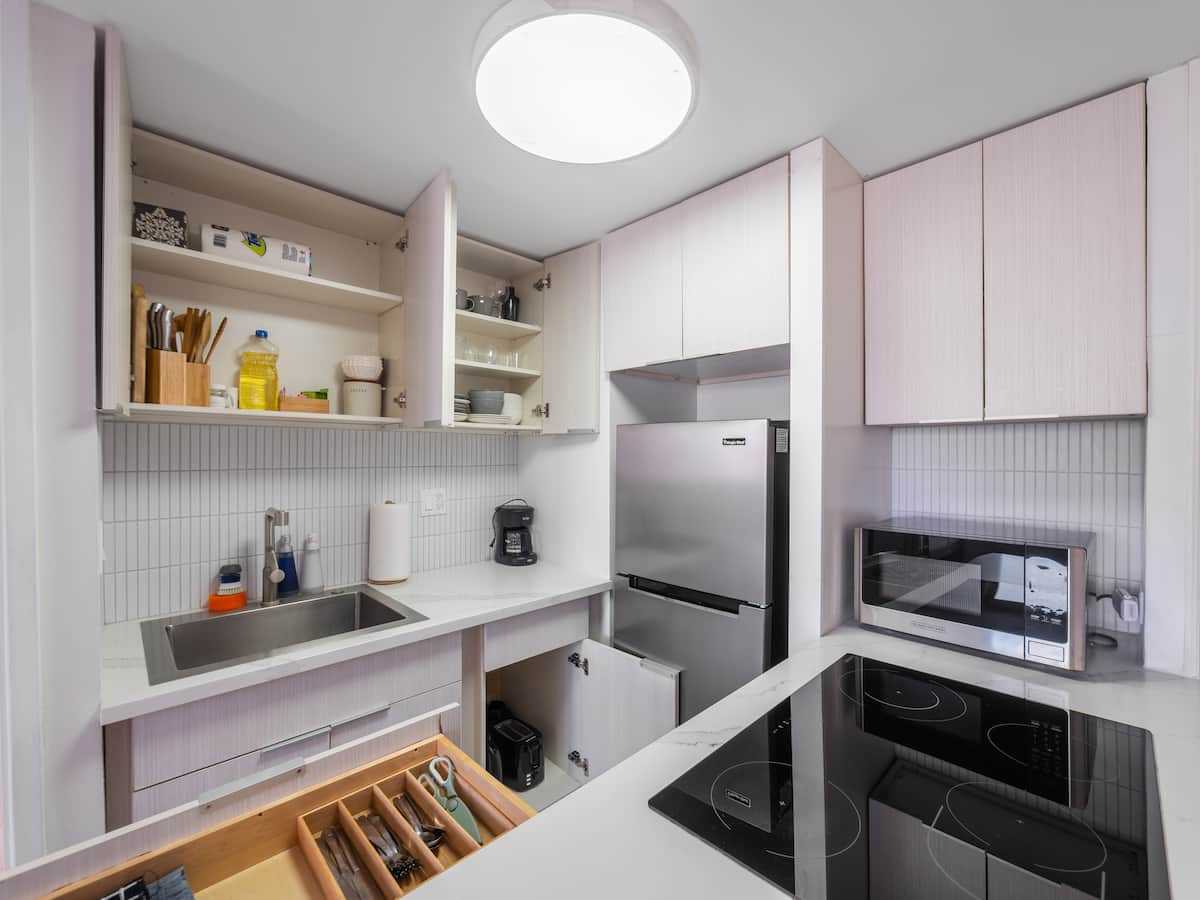 Galley kitchen viewed from the cooktop